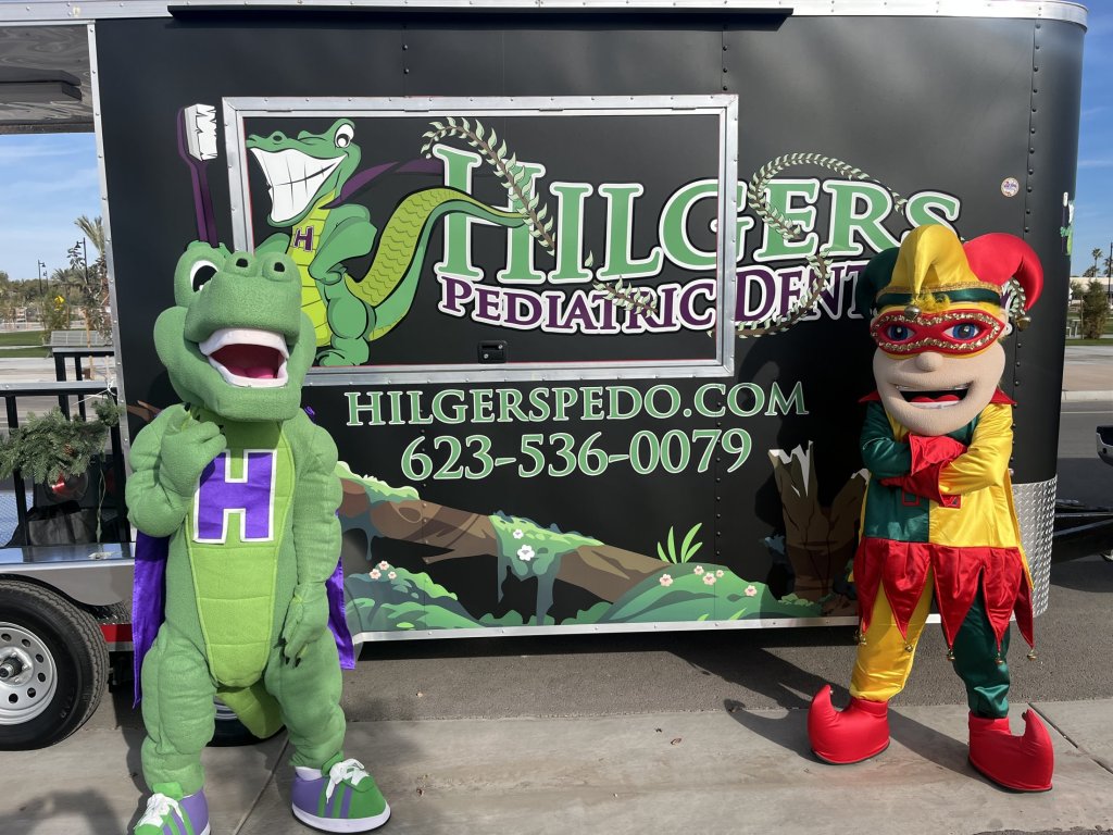 Jester and crocodile mascots